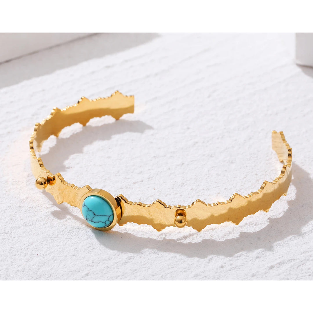 Azur - Bracelet manchette irrégulier en acier inoxydable plaqué or avec pierre turquoise - Femme