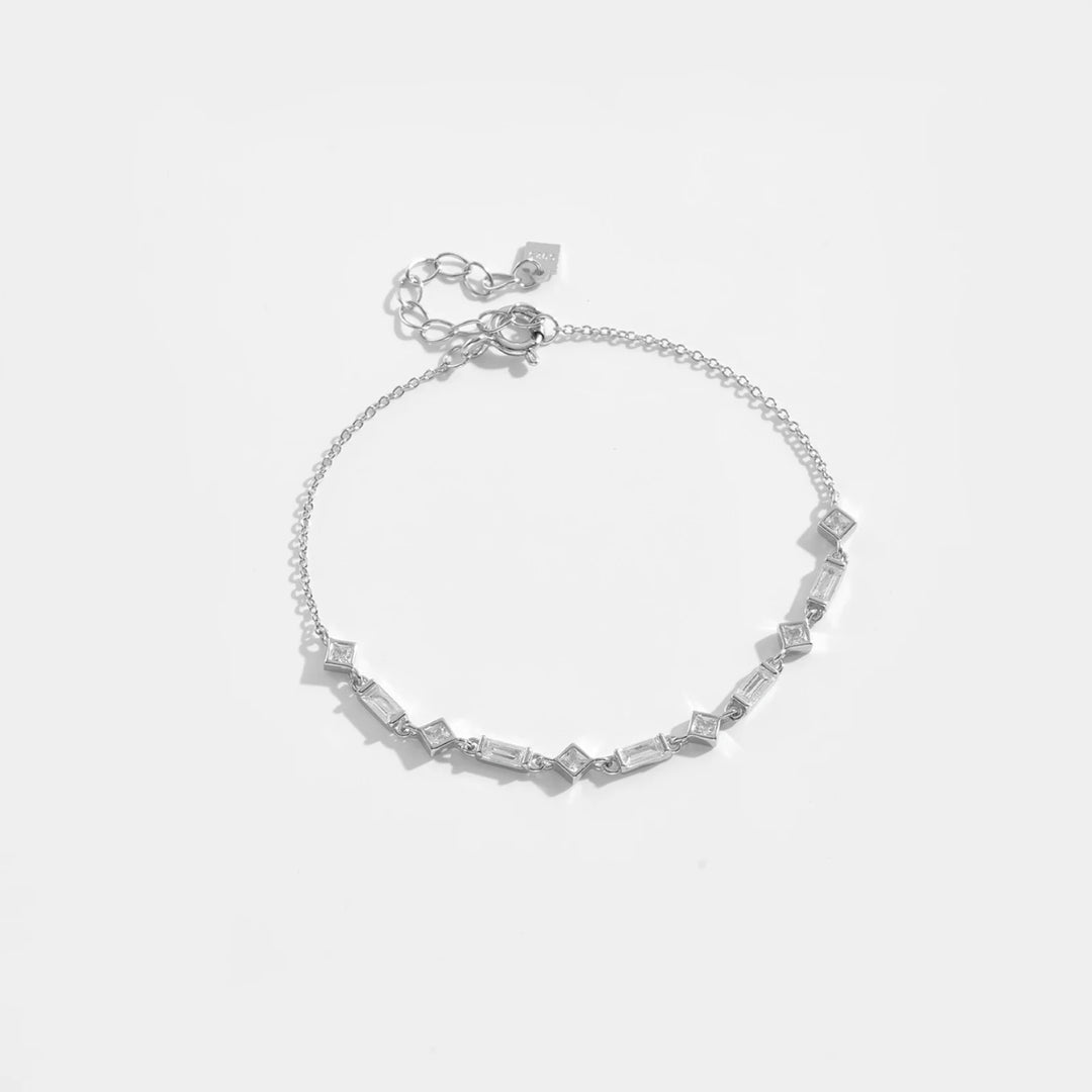 Zirconia - Bracelet avec charme en zircon noir ou blanc - Femme